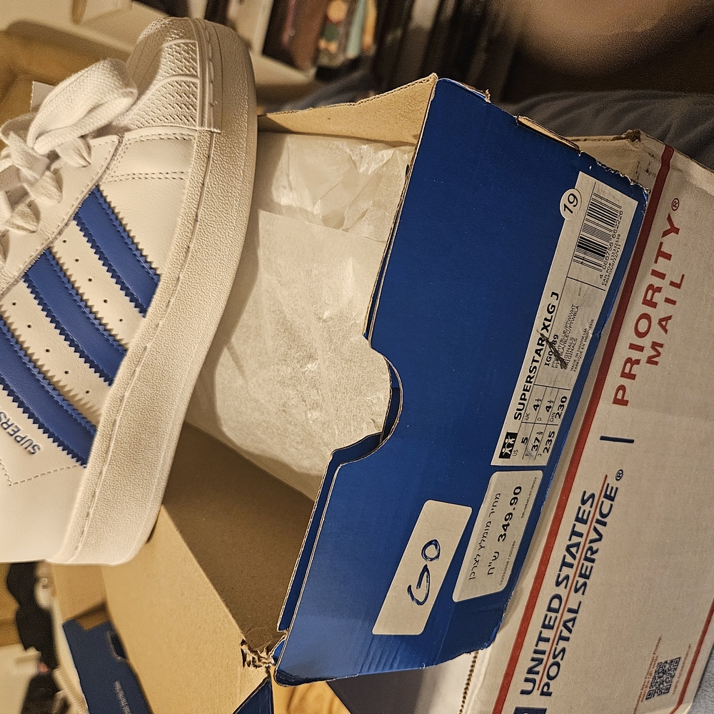 White and Blue Adidas Superstar